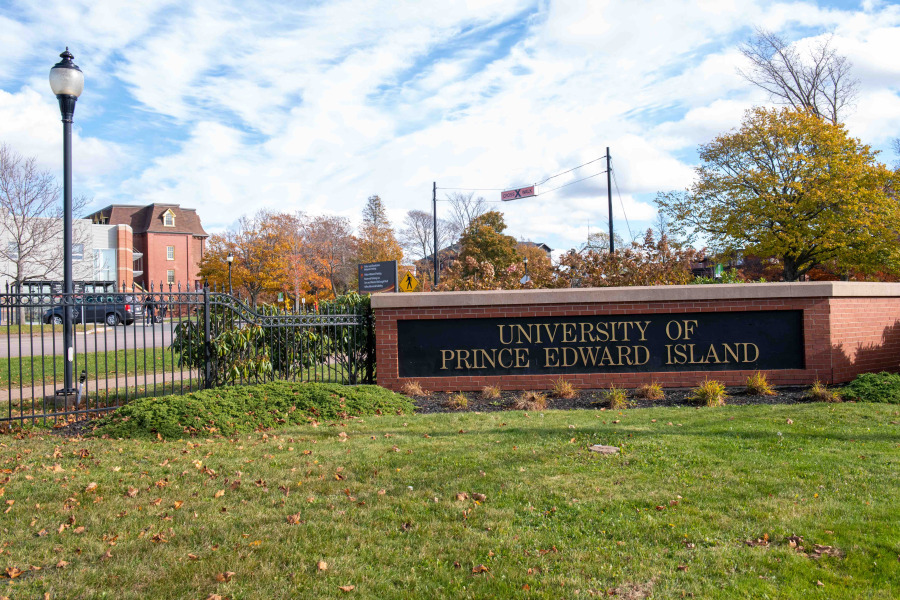 photo of sign in front of campus