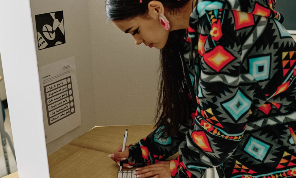 photo of a woman voting 