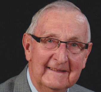 portrait photo of man wearing glasses