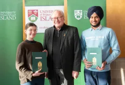Award winners, Marie-Pier Thibault-Messier, Faculty of Nursing (left) and Rupinder Singh, Faculty of Science (right) with UPEI President Emeritus Wade MacLauchlan (centre).