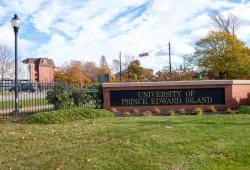 photo of sign in front of campus