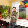 MAIS student Hexi Wang working in a student lounge